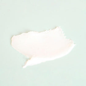 Theraplex on bedside table illustrating nighttime application for restorative hydration