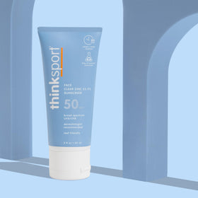 Thinksport applied to cheek showing even coverage and lightweight absorption benefit