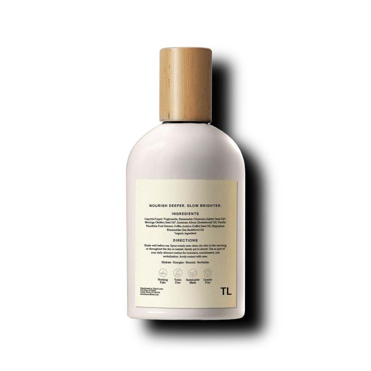 Third Layer label glass bottle detail emphasizing clean formula and botanical scent