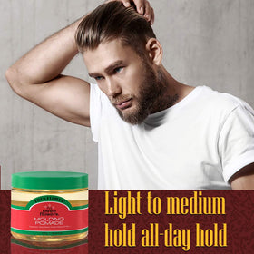 Three Flowers pomade on hands ready to apply for flexible styling