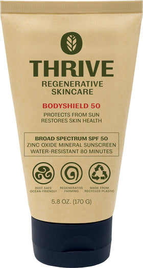 Thrive Natural Care front tube showing SPF50 and reef-safe benefit