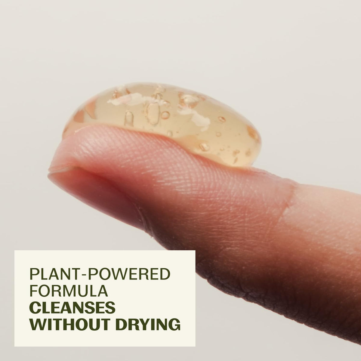 Thrive Natural Care gel texture on a fingertip highlighting gentle cleanse