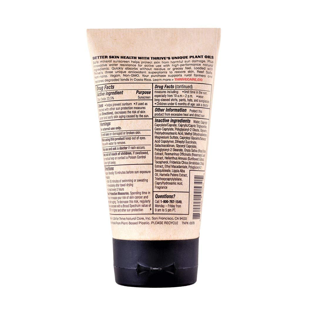 Thrive Natural Care sunscreen with water droplets showing water-resistant benefit