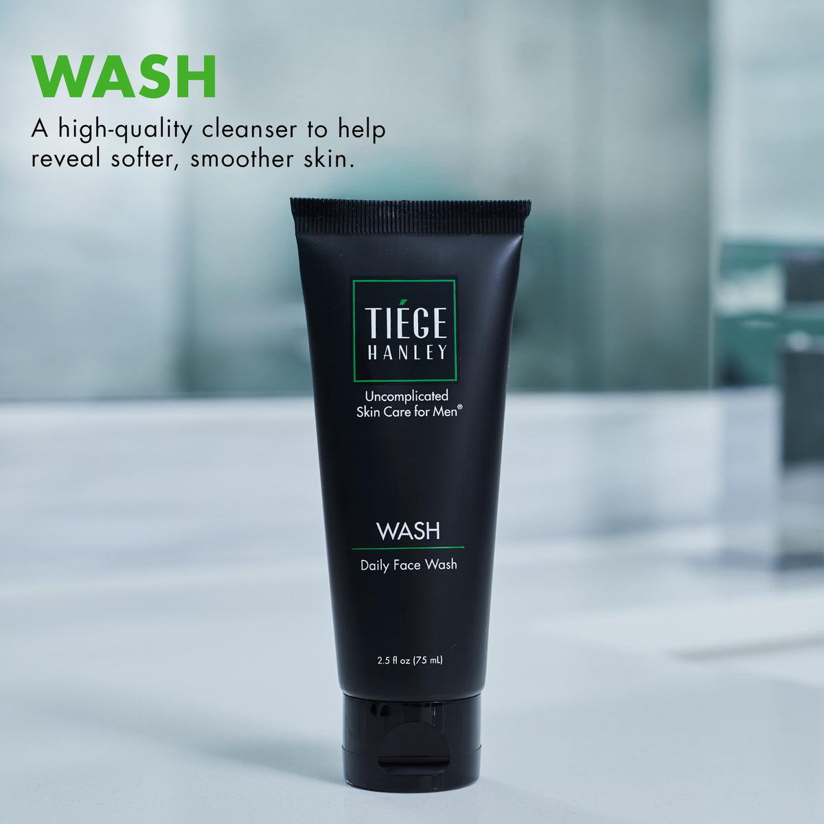 Tiege Hanley foam dispensed on hand demonstrating gentle lather for easy cleansing