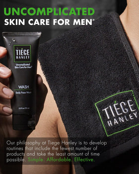 Tiege Hanley travel kit staged in bathroom to show portability and routine simplicity