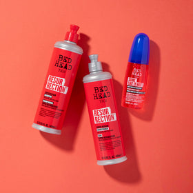 Model with restored hair after TIGI Bed Head use showing smooth shine