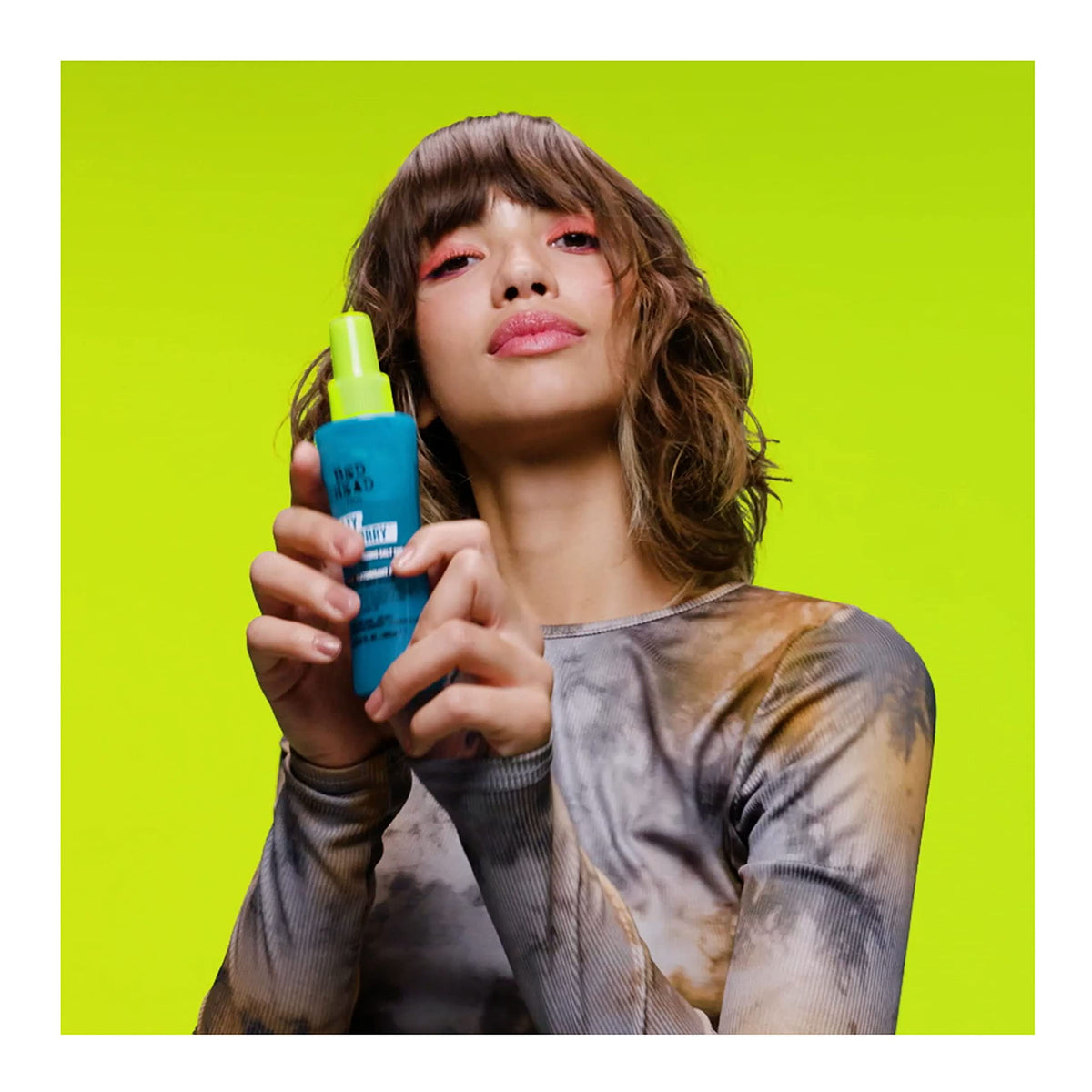 TIGI styling on dry hair creating lift and separation without crunch