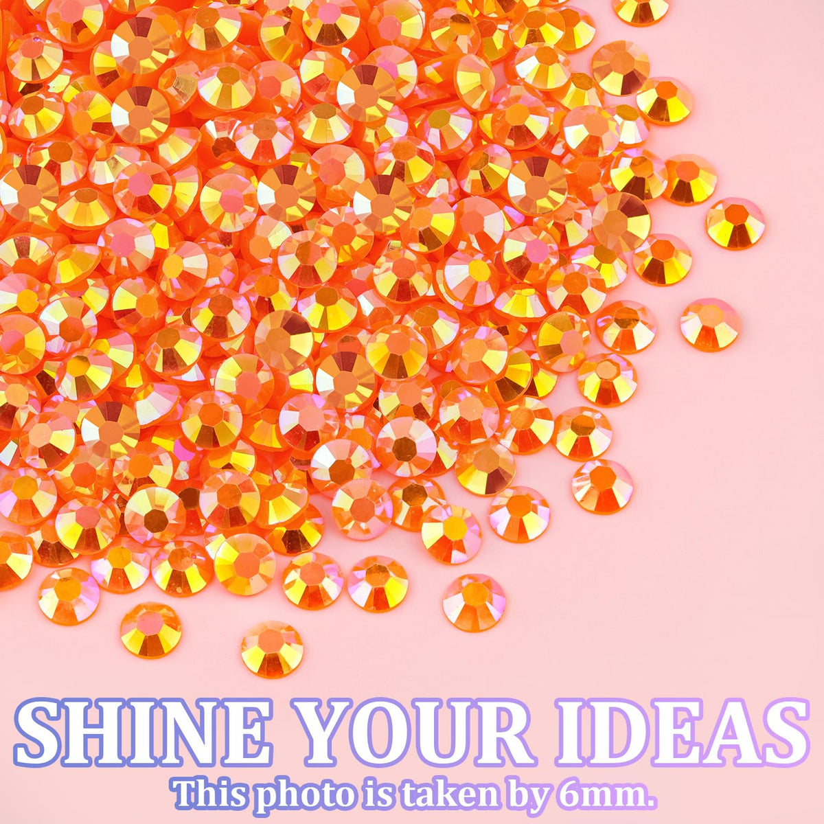 TINKRSTUFF decorated tumbler with orange AB gems demonstrating finished sparkle