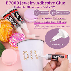 TINKRSTUFF tweezers and pickup pen shown picking up a small rhinestone for accuracy