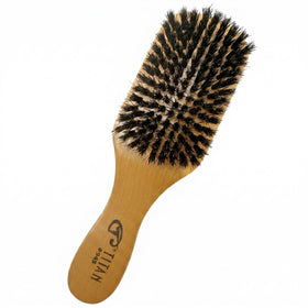Titan Club front view showing brush shape and compact design benefit portability