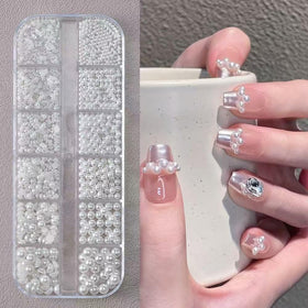 Tiwnefua rhinestones applied on an acrylic nail tip demonstrating finished manicure effect