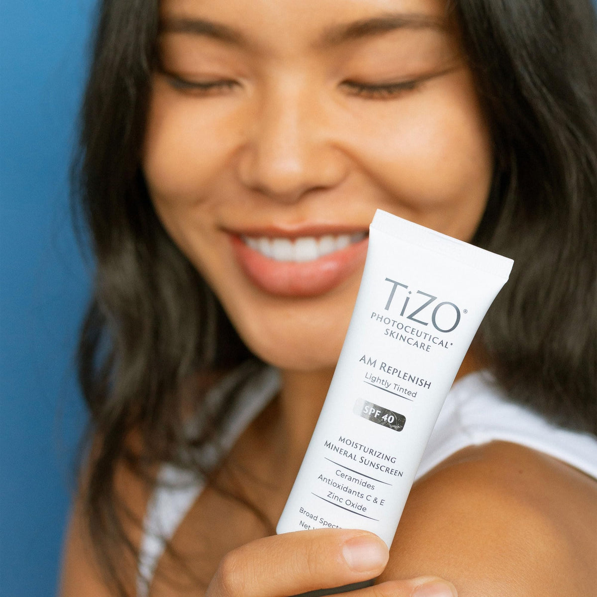 TIZO swatch on skin demonstrating light tint and reduced white cast