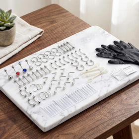 TKKUY arranged stainless steel jewelry assortment demonstrating styles and finish