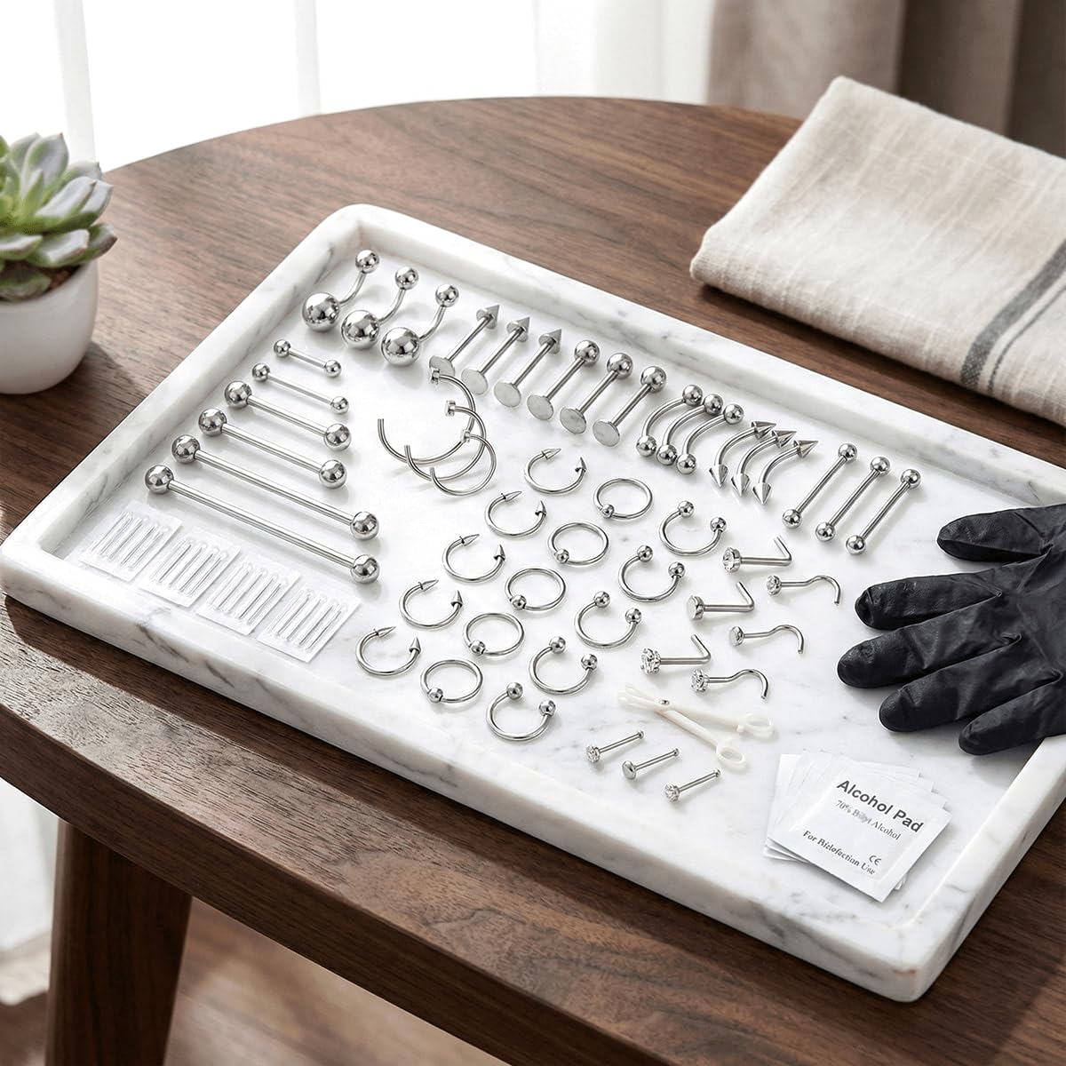 TKKUY close-up of mixed stainless-steel jewelry array highlighting variety and finish