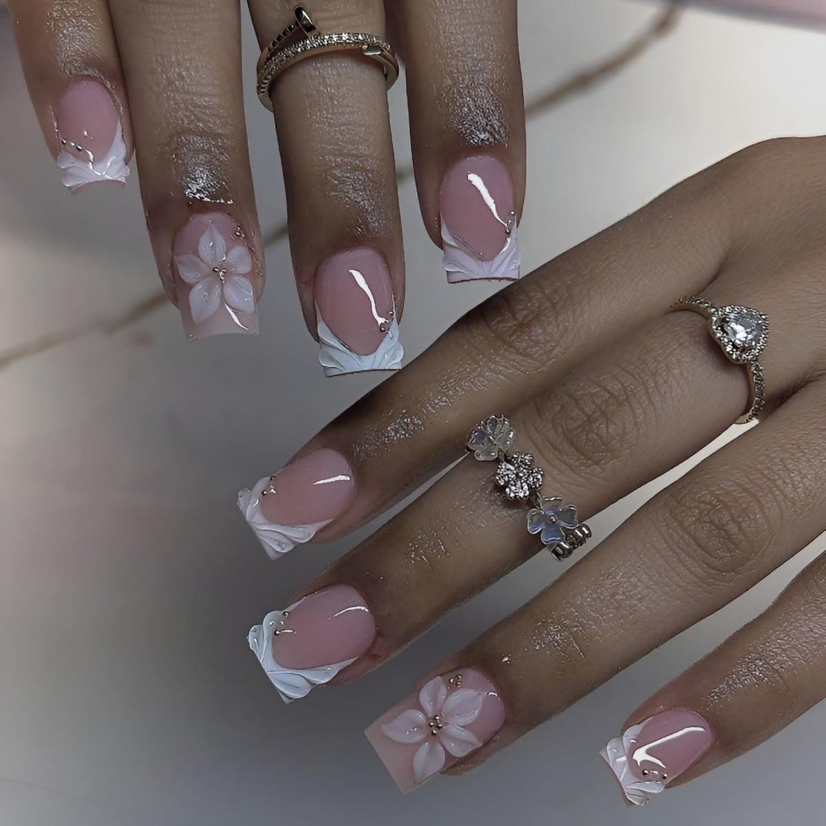 Tnbuokas front packaging showing full French tip nail set for easy styling