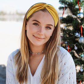 Tobeffect leopard print headband in beach setting adding playful style
