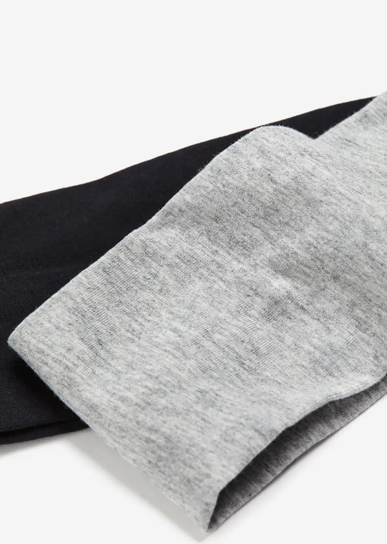 Tobeffect headband on model during yoga showing secure non-slip fit
