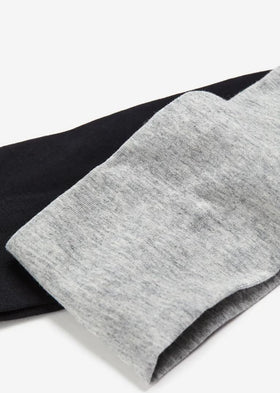 Tobeffect headband on model during yoga showing secure non-slip fit