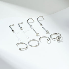 TOKRING nose piercing kit in use with marker placement for accurate piercing