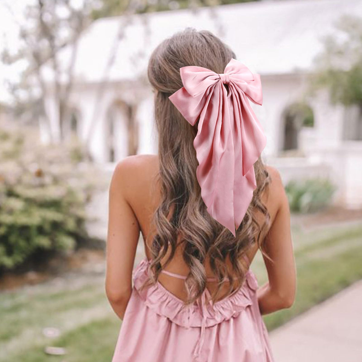 TOKUFAGU lifestyle portrait wearing bow outdoors showing wearable vintage charm