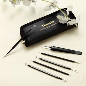 Tomata tools beside ruler showing compact size for portability and convenience