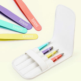 Tomata tweezers with protective caps safeguarding tips during travel