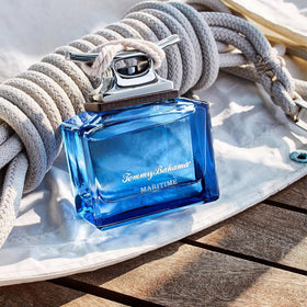 Tommy Bahama Maritime 2.5 fl oz bottle inside travel bag showing compact convenience