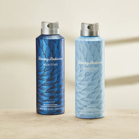 Tommy Bahama Maritime Journey held in hand to show 6 fl. oz. size and easy travel benefit