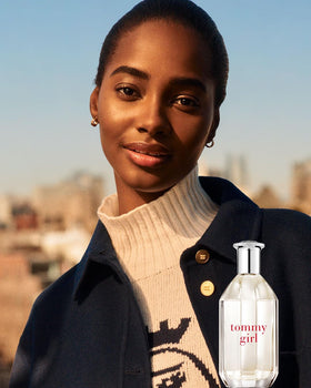 Tommy Hilfiger Tommy Girl held in hand for size reference and travel convenience