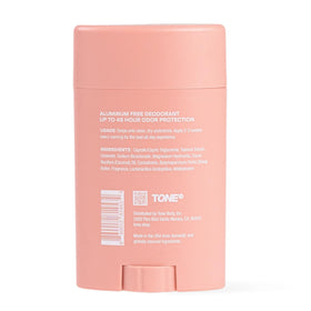 TONE Citrus next to travel items and other TONE products, shows portability and layering
