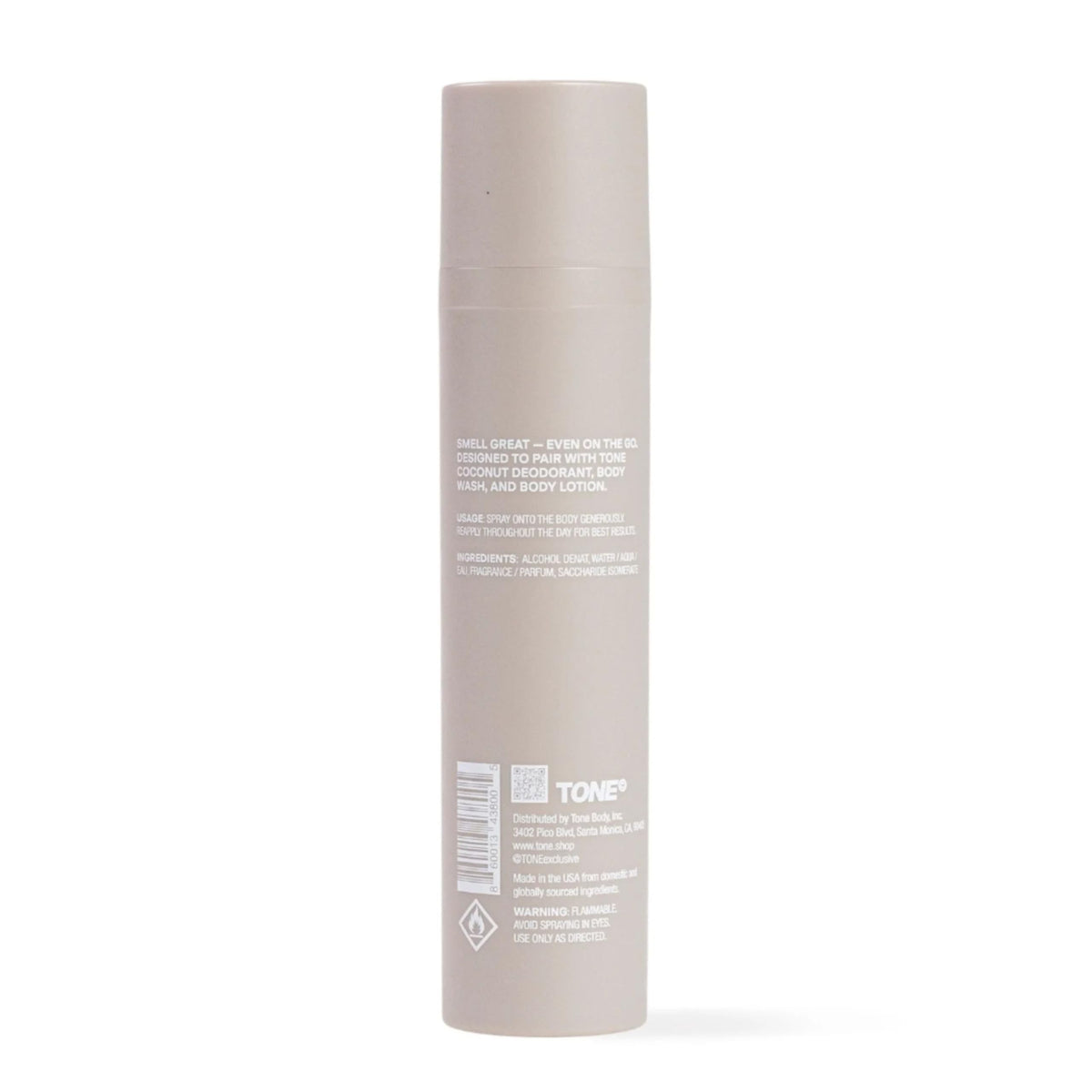 TONE Exclusive bottle in a beach scene suggesting tropical, vacation-ready scent
