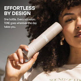 Fine mist from TONE Exclusive spray showing even dispersion and light coverage