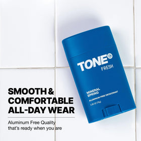 TONE Fresh being held to show 2.65 oz size and portable convenience