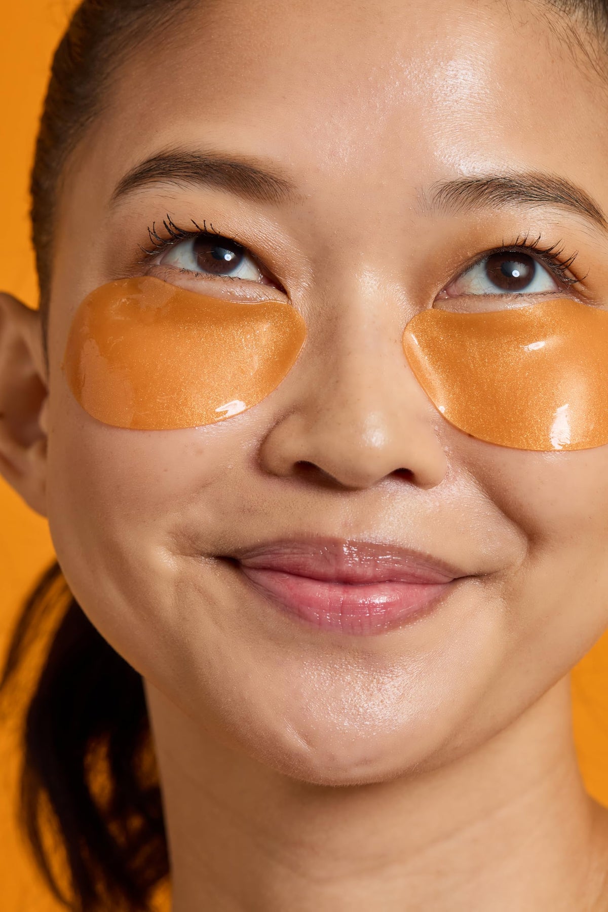 TONYMOLY droplet of serum on fingertip showing nourishing texture that hydrates skin