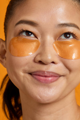 TONYMOLY droplet of serum on fingertip showing nourishing texture that hydrates skin