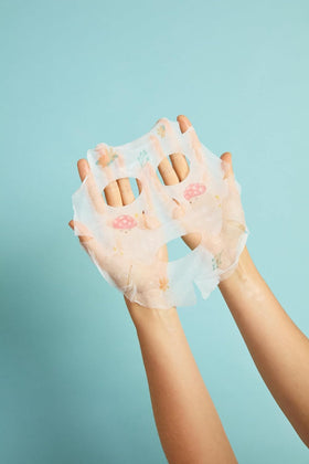 TONYMOLY essence texture on hand demonstrating hydrating, fast-absorbing finish