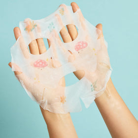 TONYMOLY bat-shaped eye patch detail applied under eye, helps reduce puffiness