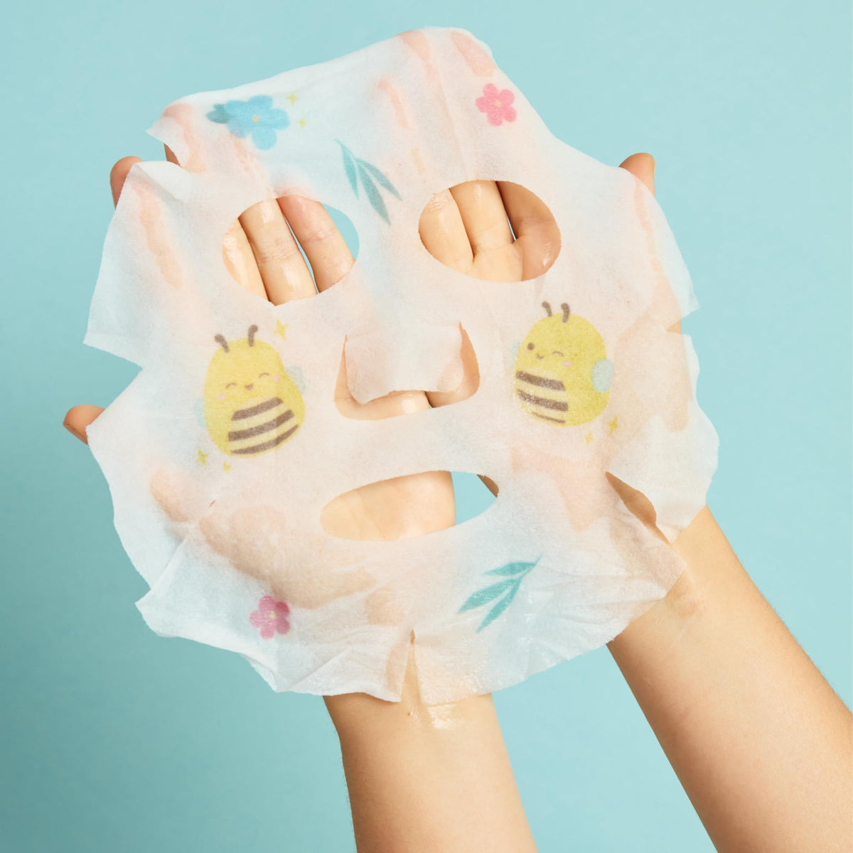 TONYMOLY foot mask pouch showing shea butter callout, softens and nourishes feet