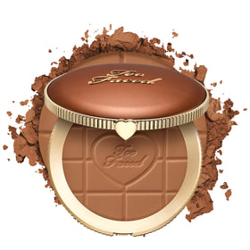 Too Faced compact front view showing matte bronzer and portable design benefit