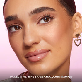 Too Faced product label close-up showing ingredient-free claims and vegan benefit