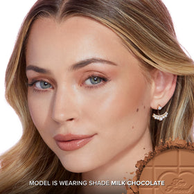 Too Faced close-up powder texture highlighting velvety finish and smooth application benefit