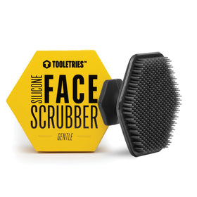 TOOLETRIES charcoal scrubber front view showing compact hygienic design and easy grip