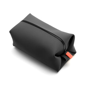 TOOLETRIES Koby front view showing compact charcoal bag and sleek look