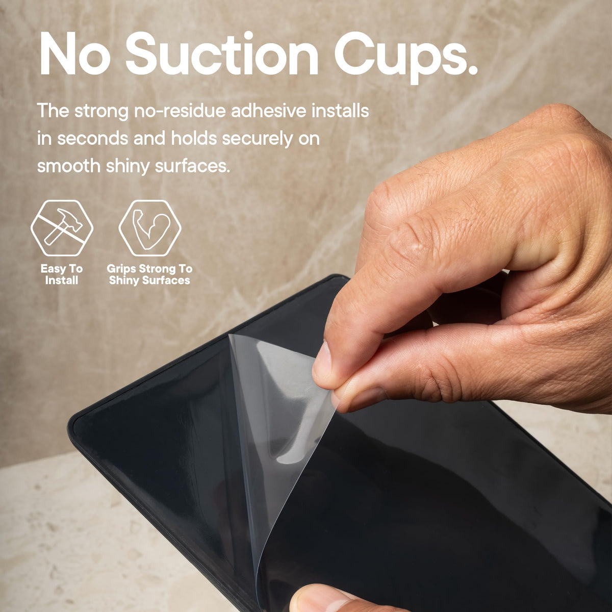 TOOLETRIES Oliver mounted on glass demonstrating tool-free installation benefit
