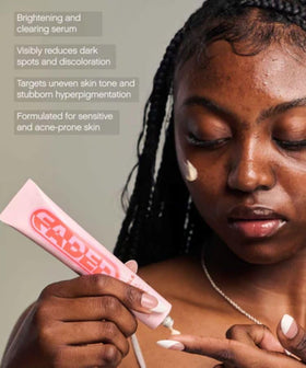 Topicals Faded serum texture close-up drop on fingertip highlighting smooth absorbent formula