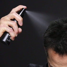 Toppik FiberHold spray nozzle close-up illustrating precise mist benefit