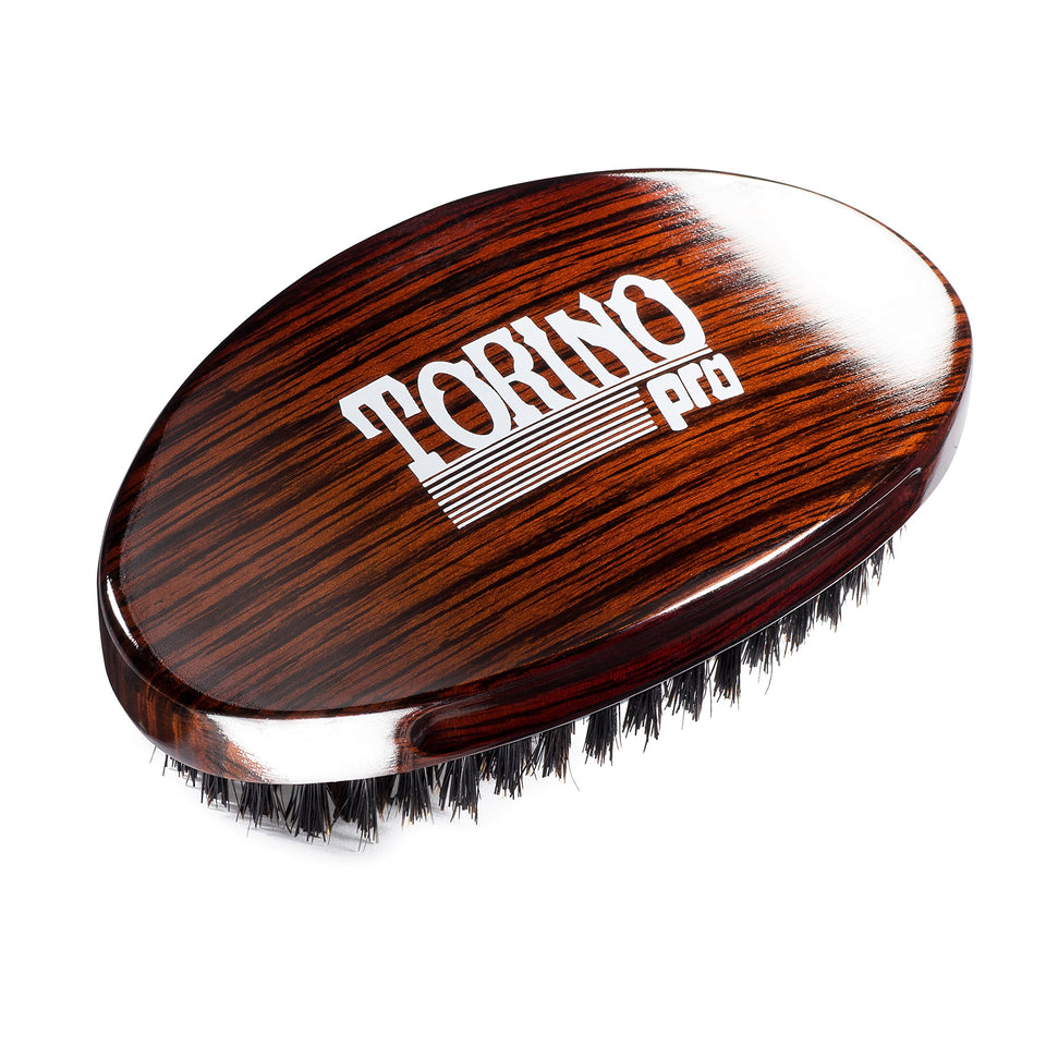 TORINO PRO Wave Brush TP730 front view showing glossy finish and ergonomic curve, promotes consistent waving