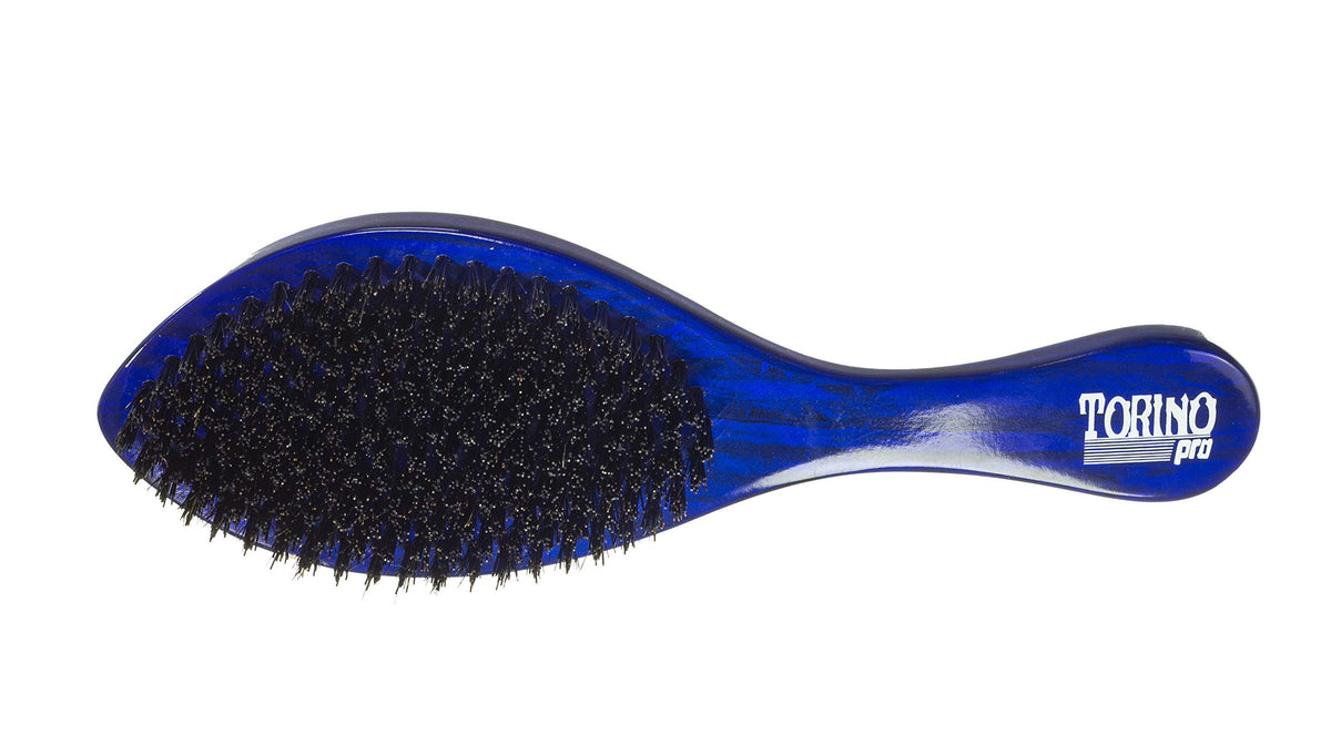 TORINO PRO WAVE BRUSHES BY BRUSH KING held in hand to show real-world scale benefit