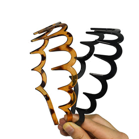 TOSEFES smooth recycled plastic finish showing snag-free hair protection