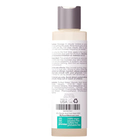 TOUCH 6 oz bottle next to everyday items for accurate size reference